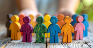Image of wooden people in multiple colors